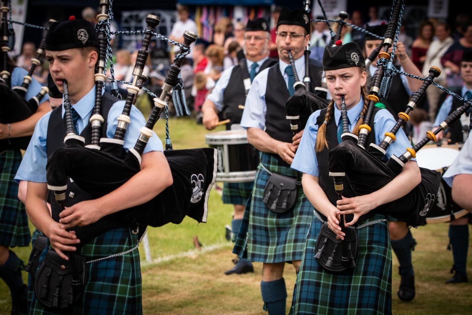 Highland Games, the parade of pipe bands Whisky Sir Edward's